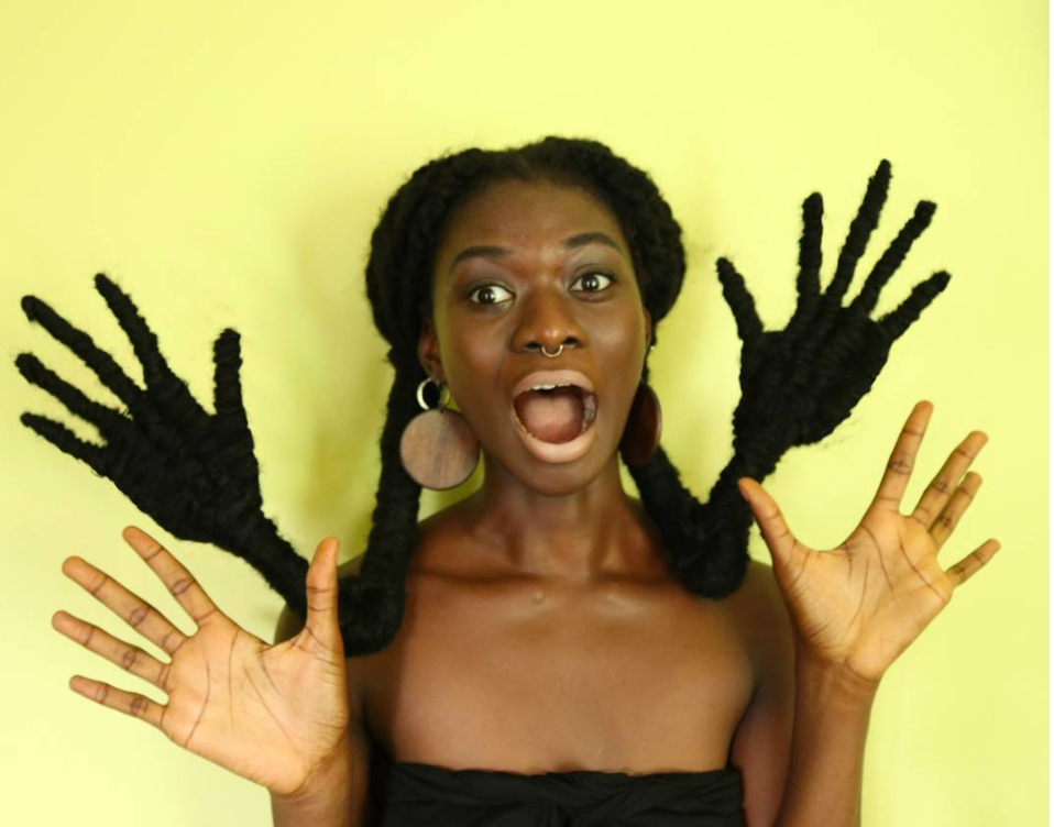 This Artist Shaped Her Glorious Hair Into A Second Pair of Hands